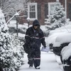 Tuyết phủ dày đặc tại Arlington, Virginia, Mỹ sau trận bão tuyết ngày 21/3/2018. (Nguồn: AFP/TTXVN) 