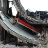 Hiện trường đổ nát sau một trận động đất kinh hoàng ở thị trấn Lingguan, tỉnh Tứ Xuyên, tháng 4/2013. (Nguồn: AFP/TTXVN) 