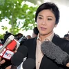 Cựu Thủ tướng Thái Lan Yingluck Shinawatra trả lời báo giới sau phiên tòa ở Bangkok ngày 19/5/2015. (Nguồn: AFP/TTXVN) 
