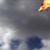 Máy bay không người lái của phiến quân Houthi phát nổ tại lễ diễu binh của binh sỹ Yemen ở căn cứ không quân al-Anad, tỉnh Lahj ngày 10/1/2019. (Nguồn: AFP/TTXVN) 