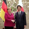 Thủ tướng Đức Angela Merkel và người đồng cấp Nhật Bản Shinzo Abe. (Nguồn: AP) 