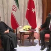 Tổng thống Thổ Nhĩ Kỳ Recep Tayyip Erdogan (phải) và người đồng cấp Iran Hassan Rouhani. (Nguồn: almasdarnews.com) 