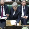 Thủ tướng Anh Theresa May (phía trước) tại phiên họp của Hạ viện ở London ngày 13/2/2019. (Nguồn: THX/TTXVN) 