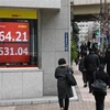 Bảng tỷ giá chứng khoán tại thủ đô Tokyo, Nhật Bản. (Nguồn: AFP/TTXVN) 