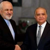 Ngoại trưởng Iraq Muhammad Ali al-Hakim (phải) gặp người đồng cấp Iran Mohammad Javad Zarif. (Nguồn: Reuters) 