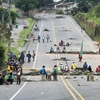 Người Colombia chặn đường trong cuộc biểu tình. (Nguồn: AFP) 
