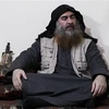 Mạng lưới truyền thông al-Furqan đăng hình ảnh thủ lĩnh IS Abu Bakr al-Baghdadi tại một địa điểm không xác định. (Nguồn: AFP/TTXVN) 