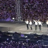 Các thành viên nhóm nhạc BTS biểu diễn tại Busan, Hàn Quốc, ngày 16/6/2019. (Nguồn: Yonhap/TTXVN) 