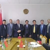 Đoàn làm việc với Bộ trưởng Bộ Thông tin Belarus. (Nguồn: Vietnam+) 