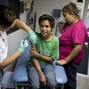 Tiêm vắcxin phòng bệnh sởi, quai bị, rubella cho người dân ở California, Mỹ. (Nguồn: AFP/TTXVN) 