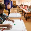 Cử tri bỏ phiếu tại điểm bầu cử ở Moskva, Nga ngày 8/9/2019. (Nguồn: AFP/TTXVN) 
