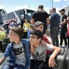 Người tị nạn Syria tập trung tại một bến xe ở Istanbul, Thổ Nhĩ Kỳ để chuẩn bị hồi hương, ngày 6/8/2019. (Nguồn: AFP/TTXVN) 