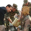 Tổng thống Syria đã có chuyến thị sát và thăm các binh sỹ ở Idlib. (Nguồn: AFP) 