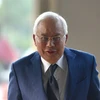 Cựu Thủ tướng Malaysia Najib Razak tới tòa án ở Kuala Lumpur, Malaysia, ngày 27/8. (Nguồn: THX/TTXVN) 