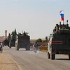 Đoàn xe quân sự Nga hướng tới thành phố Kobane, miền Đông Bắc Syria ngày 23/10/2019. (Nguồn: AFP/TTXVN) 
