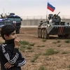 Binh sỹ Nga tham gia tuần tra chung với binh sỹ Thổ Nhĩ Kỳ tại Hasakeh, Syria. (Nguồn: AFP/TTXVN) 