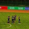 Các cầu thủ U22 Campuchia ăn mừng sau một bàn thắng. (Ảnh: Nhóm PV TTXVN tại Campuchia) 