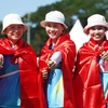 Ba cung thủ Việt Nam trên bục nhận huy chương. (Ảnh: Vietnam+)