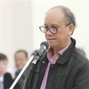 Bị cáo Trần Văn Minh (sinh năm 1955, cựu Chủ tịch Ủy ban Nhân dân thành phố Đà Nẵng, giai đoạn 2006-2011) trả lời các câu hỏi của Luật sư bào chữa. (Ảnh: Doãn Tấn/TTXVN) 
