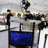 Thiết bị cảm biến nhiệt được sử dụng để kiểm tra thân nhiệt của hành khách tại sân bay Narita ở Chiba, Nhật Bản ngày 23/1/2020. (Nguồn: AFP/TTXVN) 