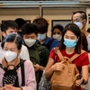 Người dân đeo khẩu trang phòng tránh lây nhiễm virus corona tại Bangkok, Thai Lan, ngày 27/1/2020. (Nguồn: AFP/TTXVN) 