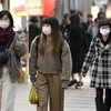 Người dân đeo khẩu trang đề phòng lây nhiễm virus corona tại Nara, Nhật Bản. (Nguồn: Kyodo/TTXVN) 