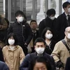 Người dân Nhật Bản đeo khẩu trang phòng dịch viêm phổi do virus corona chủng mới tại Nara, ngày 29/1/2020. (Nguồn: Kyodo/TTXVN) 