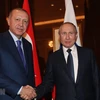 Tổng thống Nga Vladimir Putin (phải) và Tổng thống Thổ Nhĩ Kỳ Recep Tayyip Erdogan trong cuộc gặp tại Berlin, Đức, ngày 19/1/2020. (Ảnh: AFP/TTXVN) 