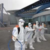 Phun thuốc khử trùng tại một nhà ga ở Daegu, Hàn Quốc, ngày 29/2/2020, nhằm ngăn chặn sự lây lan của COVID-19. (Nguồn: THX/TTXVN) 