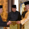 Ông Muhyiddin Yassin (trái) tại lễ nhậm chức Thủ tướng Malaysia ở Kuala Lumpur ngày 1/3/2020. (Nguồn: AFP/TTXVN) 