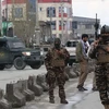 Lực lượng an ninh Afghanistan gác gần hiện trường một vụ tấn công ở Kabul ngày 25/3/2020. (Nguồn: AFP/TTXVN) 