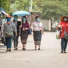 Người dân đeo khẩu trang phòng lây nhiễm COVID-19 tại Vientiane, Lào. (Nguồn: THX/TTXVN) 