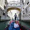Đi thuyền tại Venice, Italy. (Nguồn: AFP/TTXVN) 