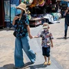 Người dân đeo khẩu trang phòng lây nhiễm COVID-19 trên đường phố tại Thái Lan ngày 19/5/2020. (Nguồn: AFP/TTXVN) 