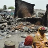 Hiện trường một vụ tấn công tại Ngala, huyện Gamboru Ngala, bang Borno, Đông Bắc Nigeria. (Nguồn: AFP/TTXVN) 