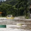 Mực nước mưa ở vùng Amakusa, tỉnh Kumamoto đã dâng lên tới 98ml/giờ. (Nguồn: AP) 