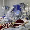 Bệnh nhân nhiễm COVID-19 điều trị tại bệnh viện ở Tehran, Iran. (Nguồn: AFP/TTXVN) 