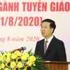 Trưởng Ban Tuyên giáo Trung ương Võ Văn Thưởng đọc diễn văn kỷ niệm. (Ảnh: Văn Điệp/TTXVN)