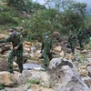 Cán bộ, chiến sỹ Đồn Biên phòng Si Ma Cai tuần tra kiểm soát khu vực biên giới. (Ảnh: Dương Giang/TTXVN) 