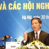 Bộ trưởng Bộ Công thương Trần Tuấn Anh trả lời phỏng vấn báo chí. (Ảnh: Trần Việt/TTXVN)