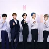 Các thành viên nhóm nhạc Hàn Quốc BTS trong cuộc họp báo trực tuyến ra mắt đĩa đơn Dynamite tại Seoul, Hàn Quốc, ngày 21/8/2020. (Nguồn: Yonhap/TTXVN) 