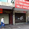 [Photo] Hàng loạt cửa hàng ở TP Hồ Chí Minh phải đóng cửa do ế ẩm