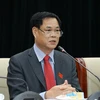 Ông Huỳnh Tấn Việt, Ủy viên Trung ương Đảng, Bí thư Đảng ủy Khối các cơ quan Trung ương chủ trì buổi họp báo. (Ảnh: Văn Điệp/TTXVN) 