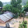 Hàng trăm hộ dân tại xã Đăk Pek, huyện Đăk Glei (Kon Tum) phải di dời do mưa bão khiến mực nước dâng cao. (Ảnh: TTXVN phát) 