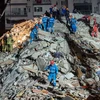 Lực lượng cứu hộ khắc phục hậu quả trận động đất ở Izmir, Thổ Nhĩ Kỳ ngày 30/10/2020. (Nguồn: AFP/TTXVN) 
