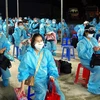 Các công dân Việt Nam từ Đài Loan (Trung Quốc) về nước đã hoàn thành thời gian cách ly tại Sóc Trăng hôm 11/11. (Ảnh: Trung Hiếu/TTXVN) 