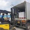 Ớt đóng thùng được vận chuyển lên xe tải để xuất khẩu sang Trung Quốc, tại Namwon, tỉnh Nam Jeolla, Hàn Quốc ngày 25/8/2020. (Nguồn: Yonhap/TTXVN) 
