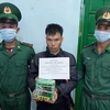 Đối tượng Nguyễn Văn Hùng bị lực lượng chức năng bắt giữ. (Ảnh: Cao Nguyên/TTXVN) 
