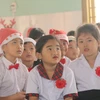 [Photo] Mang Giáng sinh ấm áp đến với những đứa trẻ đặc biệt