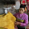 Người phụ nữ Mường đam mê giữ gìn nghề dệt vải thổ cẩm truyền thống